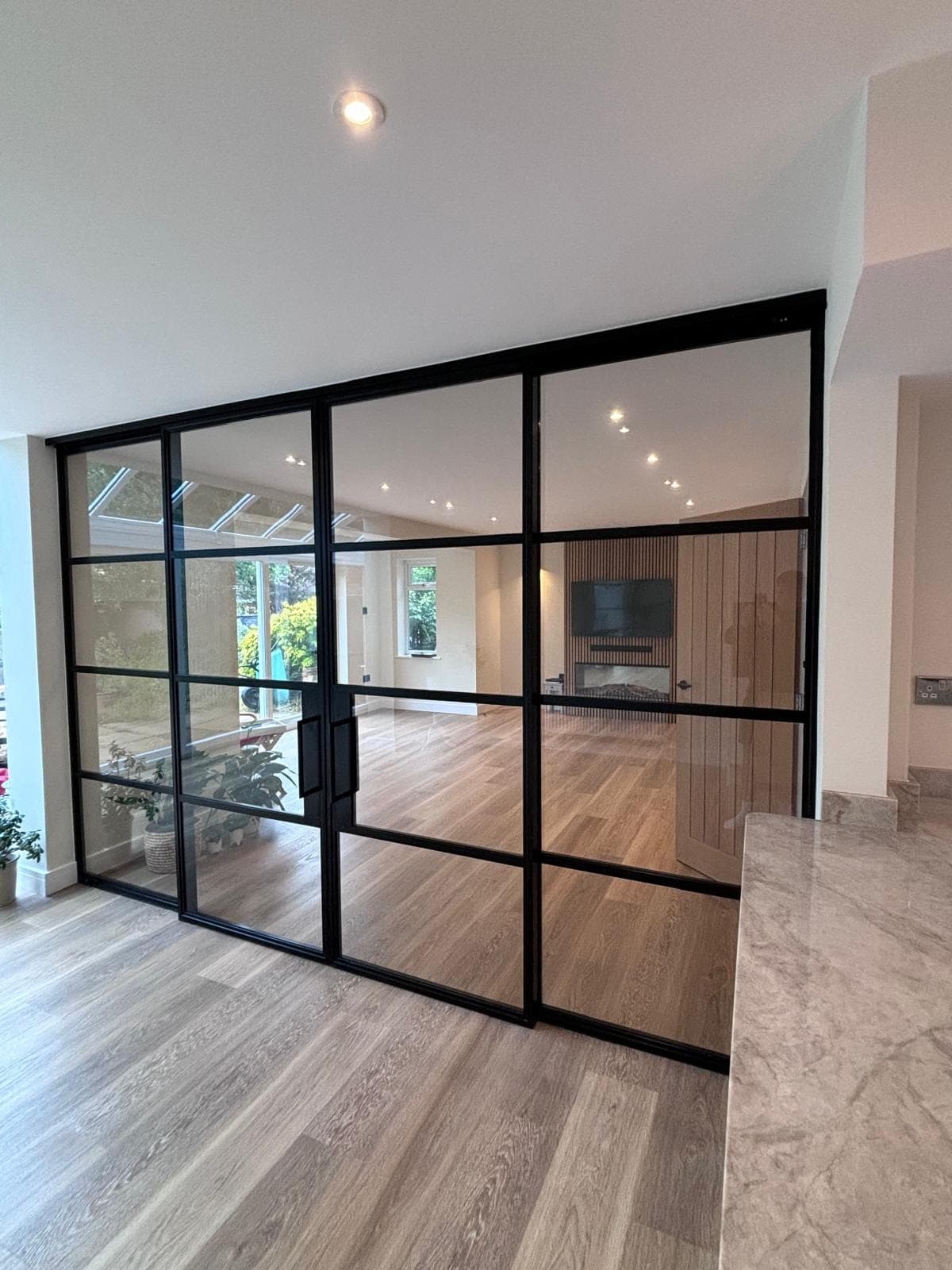 Bespoke fitted oak and glazed joinery by FR Carpentry, an example of their made-to-measure craftsmanship